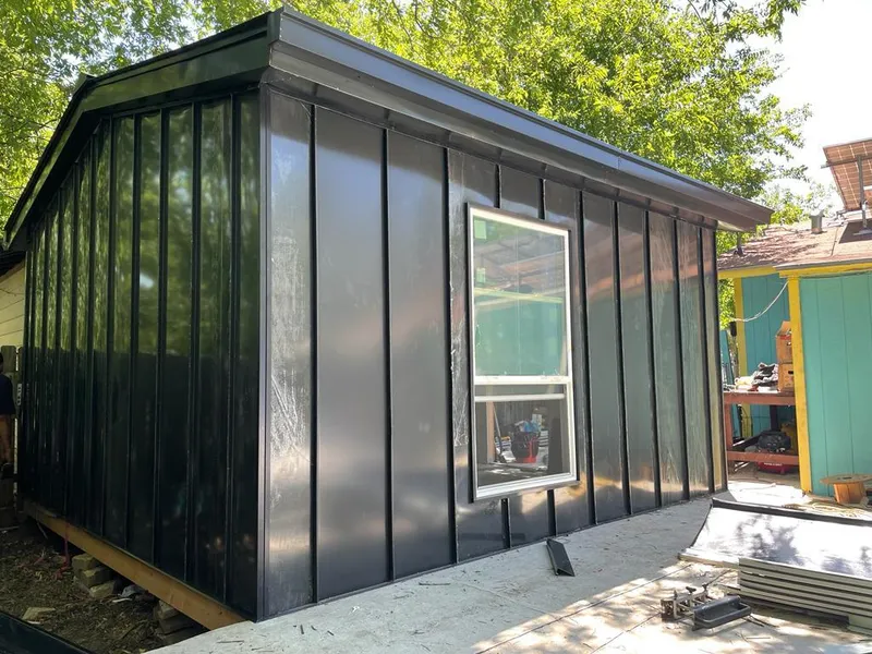 Black standing seam metal wall panels for Roof Inspection in Del Rio