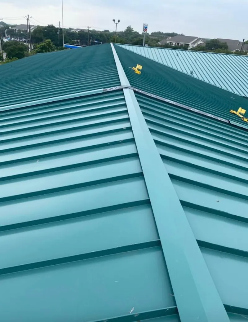 Green commercial metal roof ridge and valley for Metal Roof Repair in Del Rio
