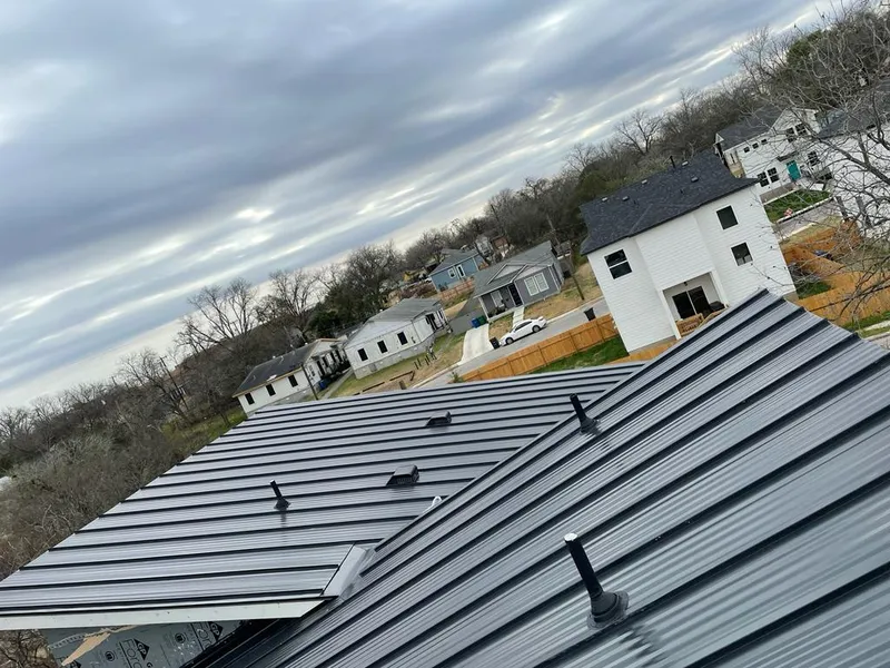 Standing seam metal roof panels with vents for Skylight Repair in Del Rio